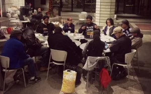 A diverse group of 11 Occu-Evolve organizers gathered at 60 Wall Street Atrium on Friday, April 10, and discussed plans for the upcoming protests. “We have been working with issues dealing with police violence and police brutality,” said Sumumba Sobukwe, 47, leader of Occu-Evolve. “We have members that are part of Stop Mass Incarceration Network that made the call for this citywide, national, international action.” Photo BY Deron Dalton