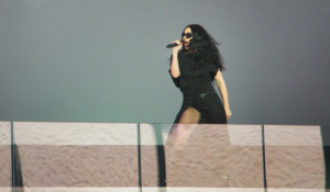 Charli XCX gives a free pop-up concert in collaboration with H&M, performing a "Brat" setlist in Times Square on Monday, Nov. 18, 2024. | Photo by Setoxxx via Wikimedia Commons, licensed under CC BY-SA 4.0. Charli XCX gives a free pop-up concert in collaboration with H&M, performing a "Brat" setlist in Times Square on Monday, Nov. 18, 2024. | Photo by Setoxxx via Wikimedia Commons, licensed under CC BY-SA 4.0.