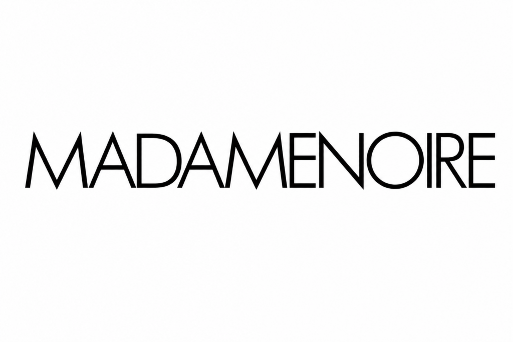 MadameNoire's logo.